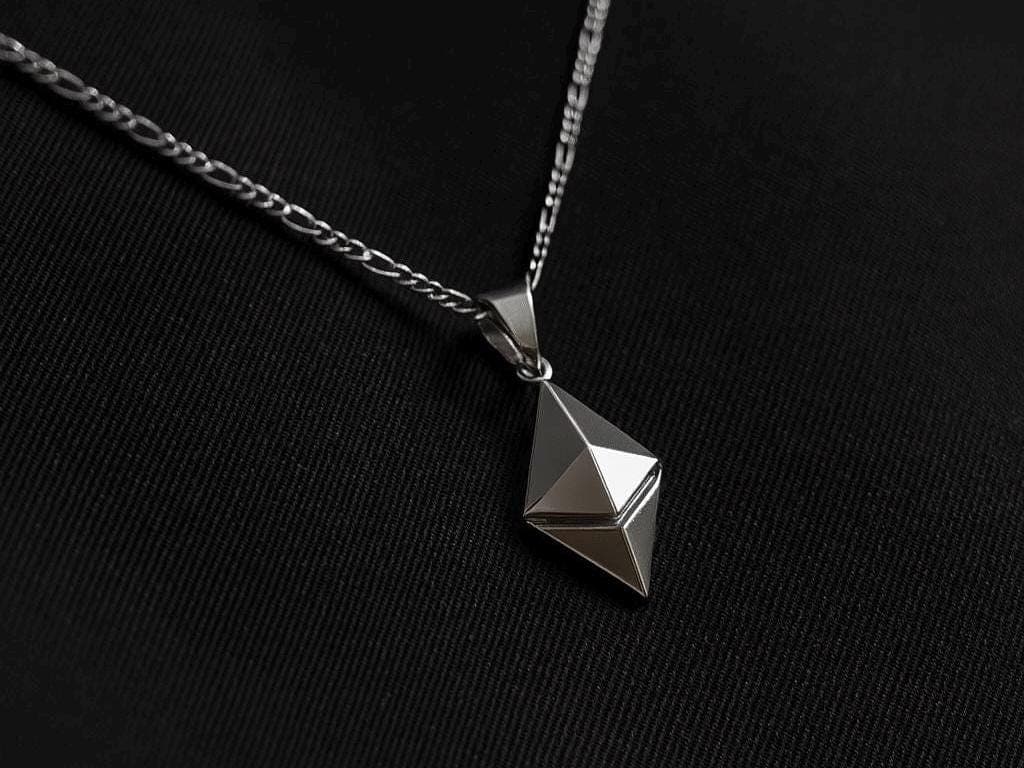 ETH Pendant in 925 silver on a figaro chain against black fabric